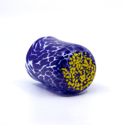 Ultramarine blue cup with yellow speckled bottom 