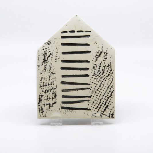Black and white clay house 