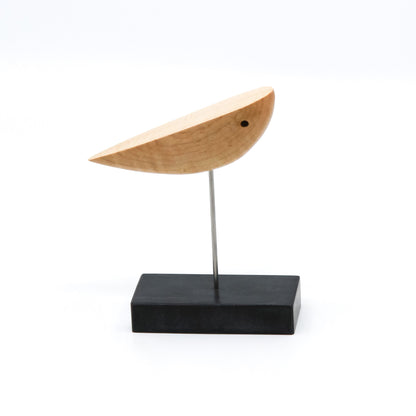 Light brown abstract bird on stand 