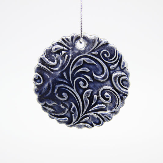 Blue and silver clay Christmas ornament with scalloped edges