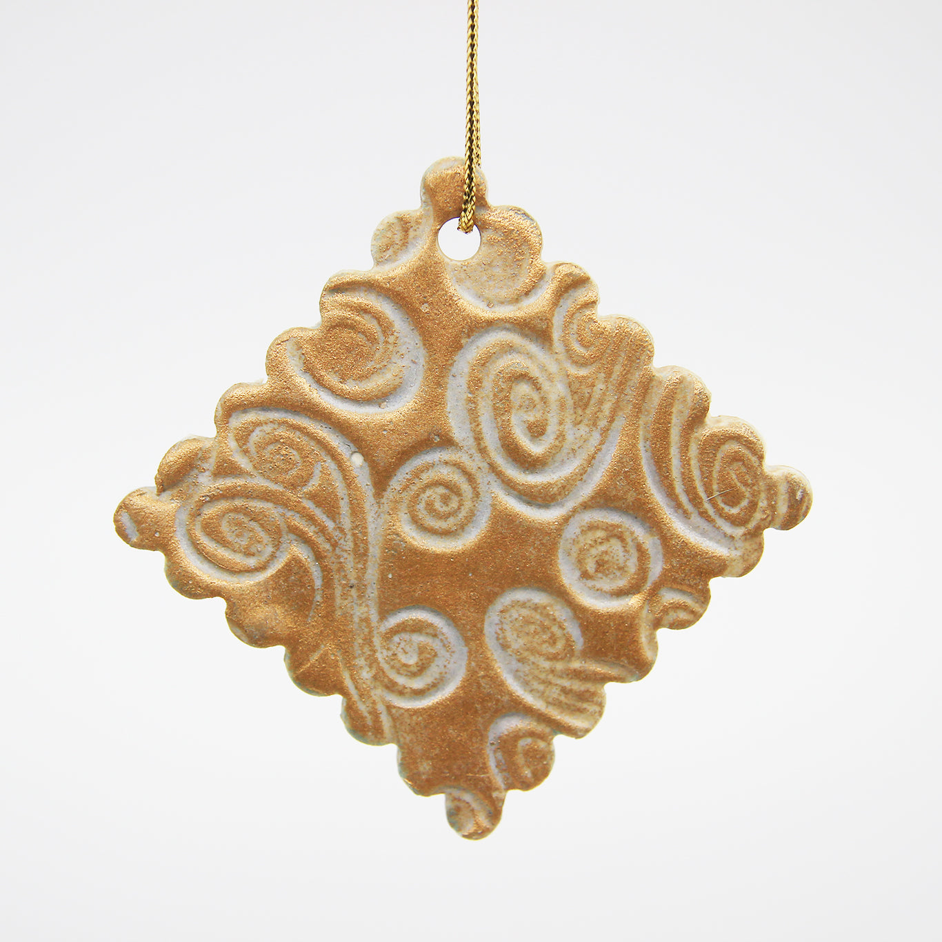 Gold diamond carved Christmas ornament with scalloped edges