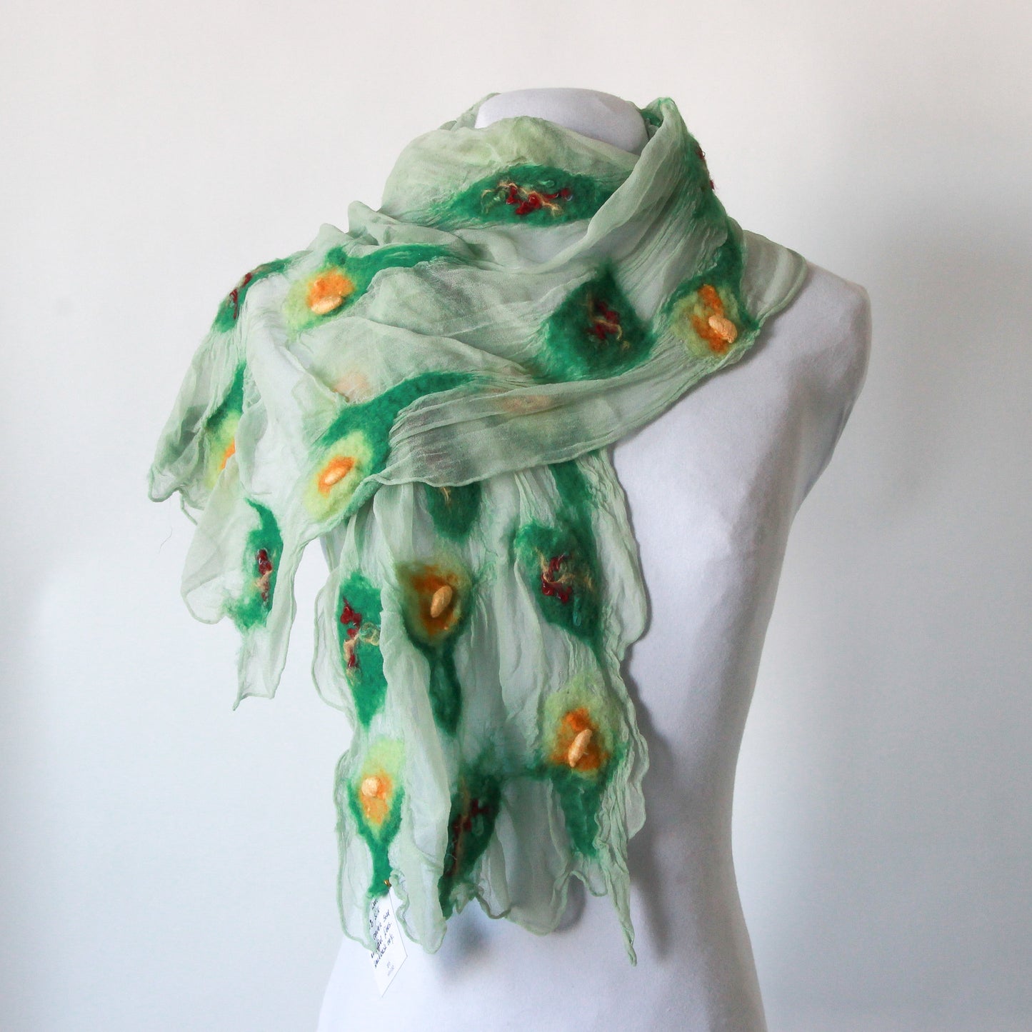 Mint scarf with green and yellow felted sections