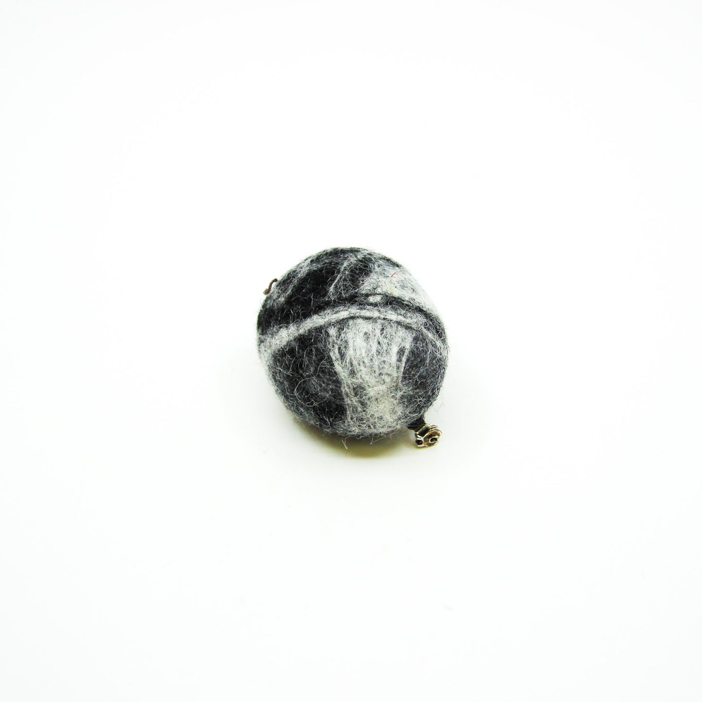 felted rock on a pin