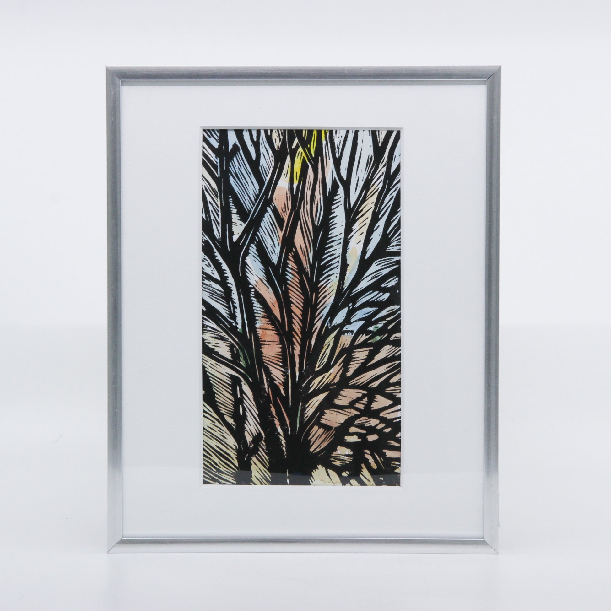 Watercolour and linocut print of a winter tree