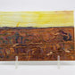 Mini art quilt of a prairie: yellow sky and brown field 