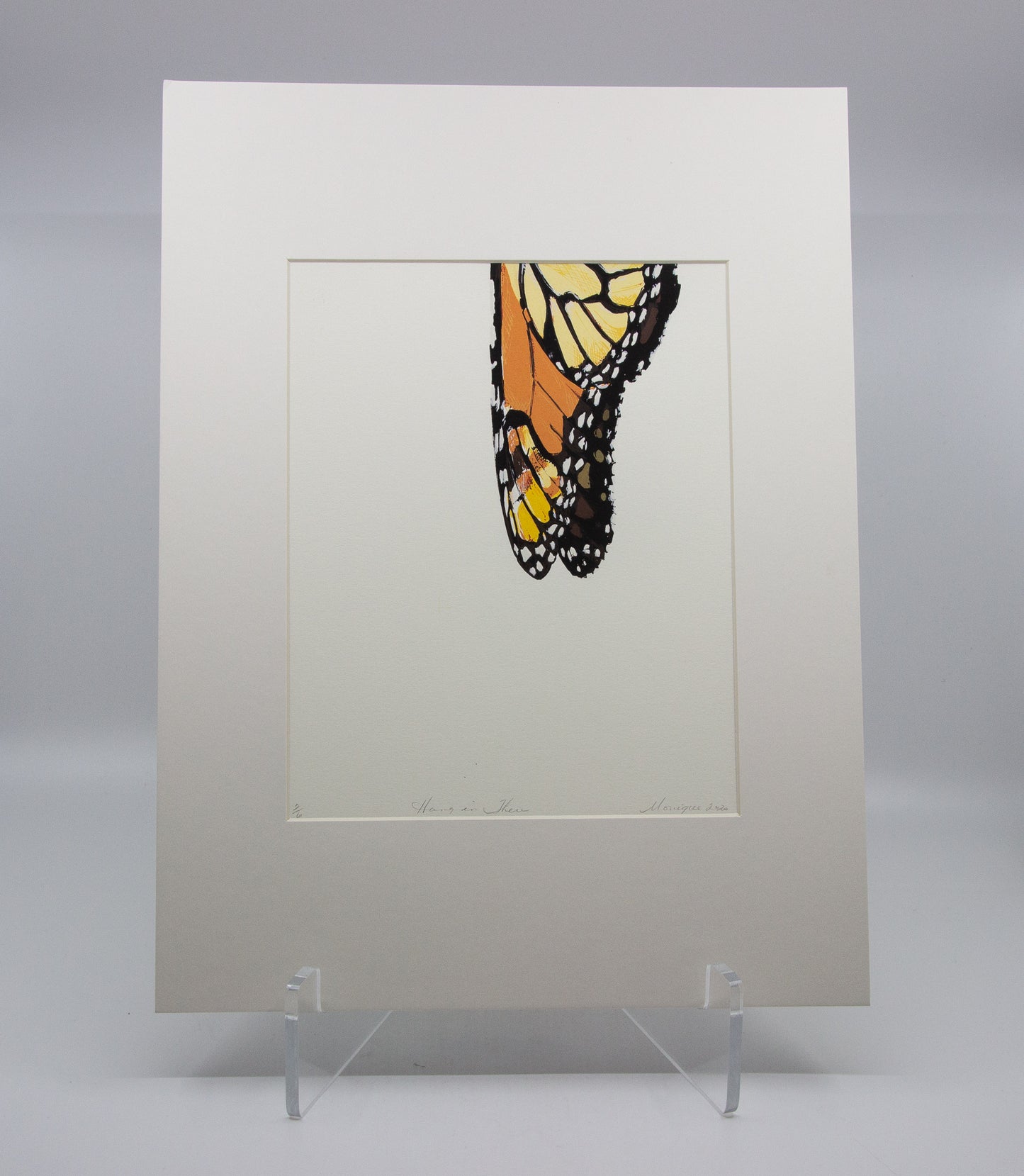 Matted print of a monarch butterfly. 2/6. 